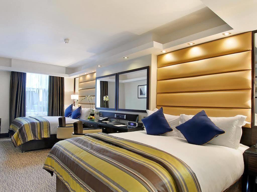 伦敦尊贵大理石拱门酒店 外观 照片 A bedroom at the Hilton London Paddington