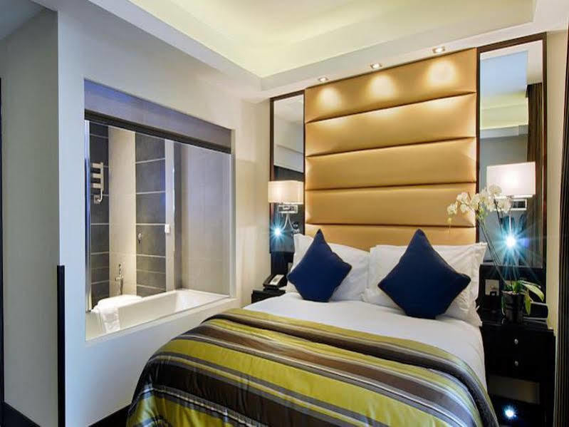 伦敦尊贵大理石拱门酒店 外观 照片 A bedroom at the hotel
